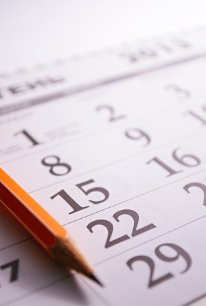 Calendar with pencil marking important school dates