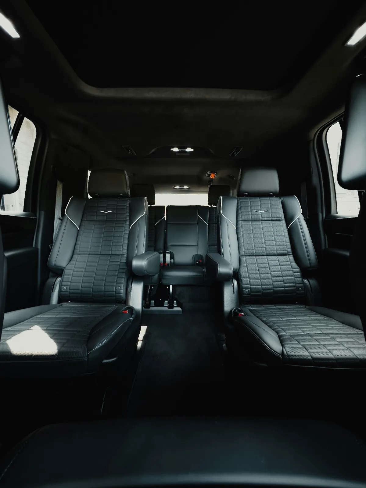 Clean Cadillac Escalade ESV passenger interior prepared for a private reservation
