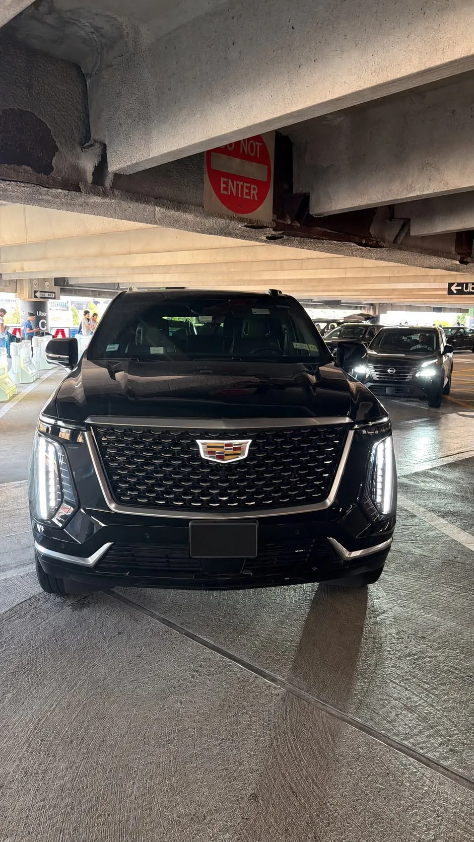GeronimoLux Cadillac Escalade waiting in the Newark Airport garage for a passenger pickup