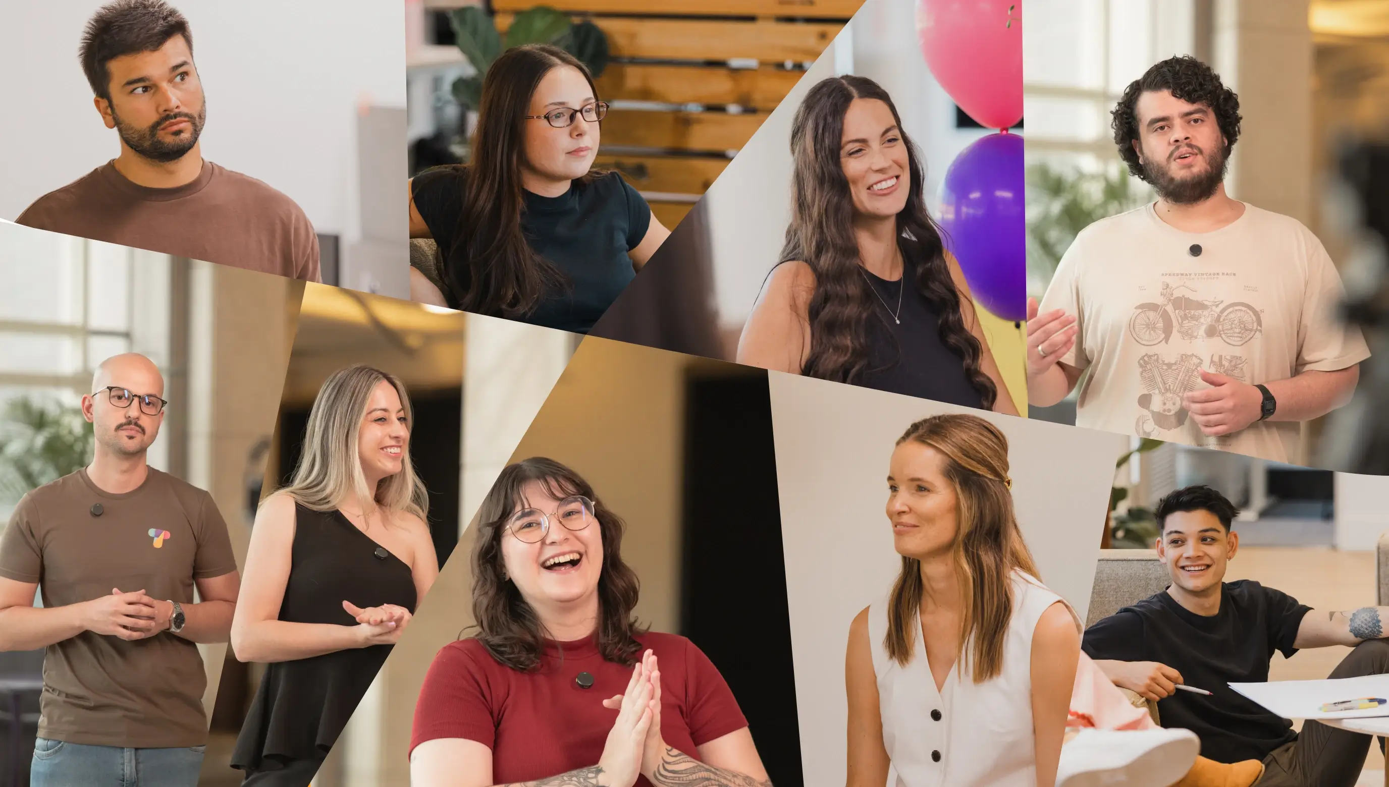Diverse group of people, multi-ethnic, smiling and engaged in a discussion or collaborative setting. Modern office environment.