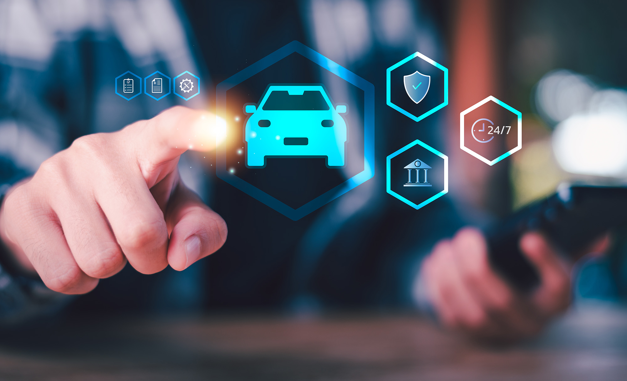 Person holding a smartphone with digital icons of a car and wireless connectivity symbols above, representing vehicle remote control or monitoring.