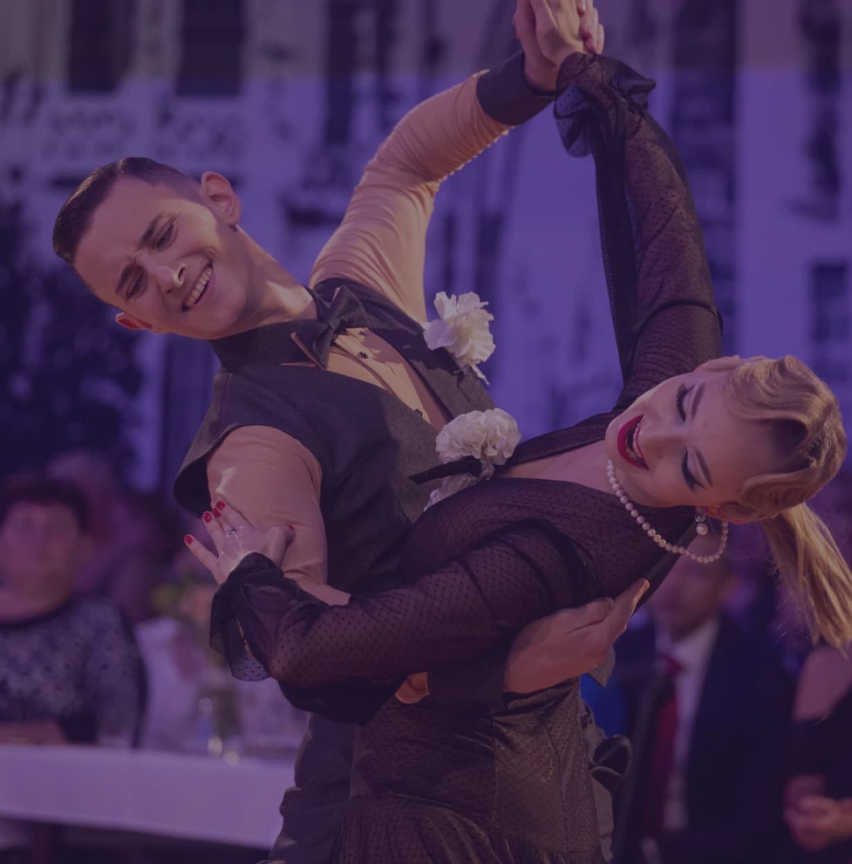 a couple performing on stage