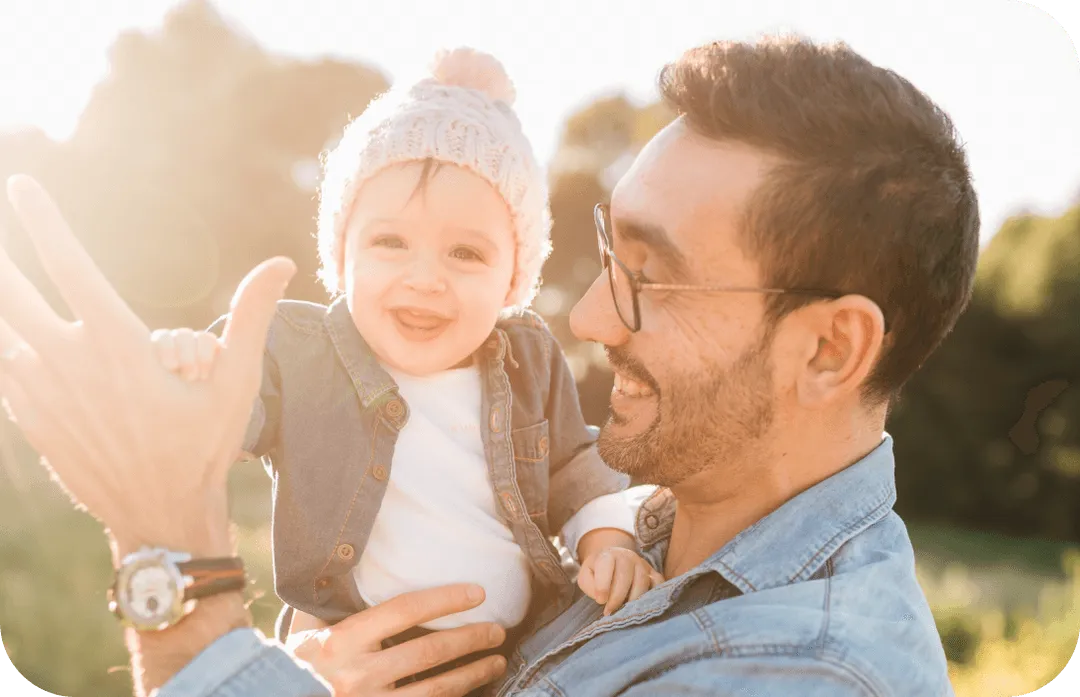 Parent and child happy playing outside