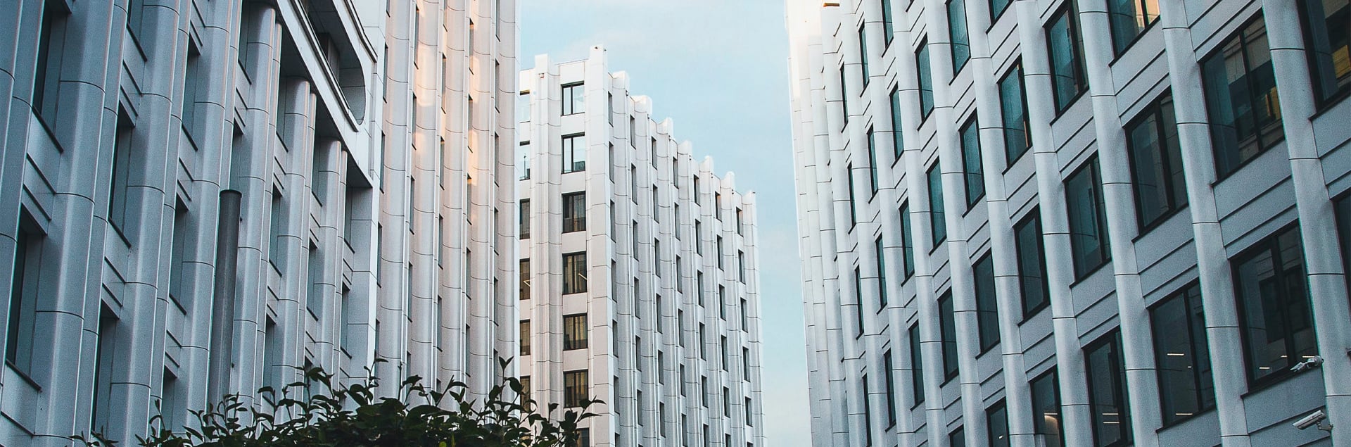 Tall white buildings.