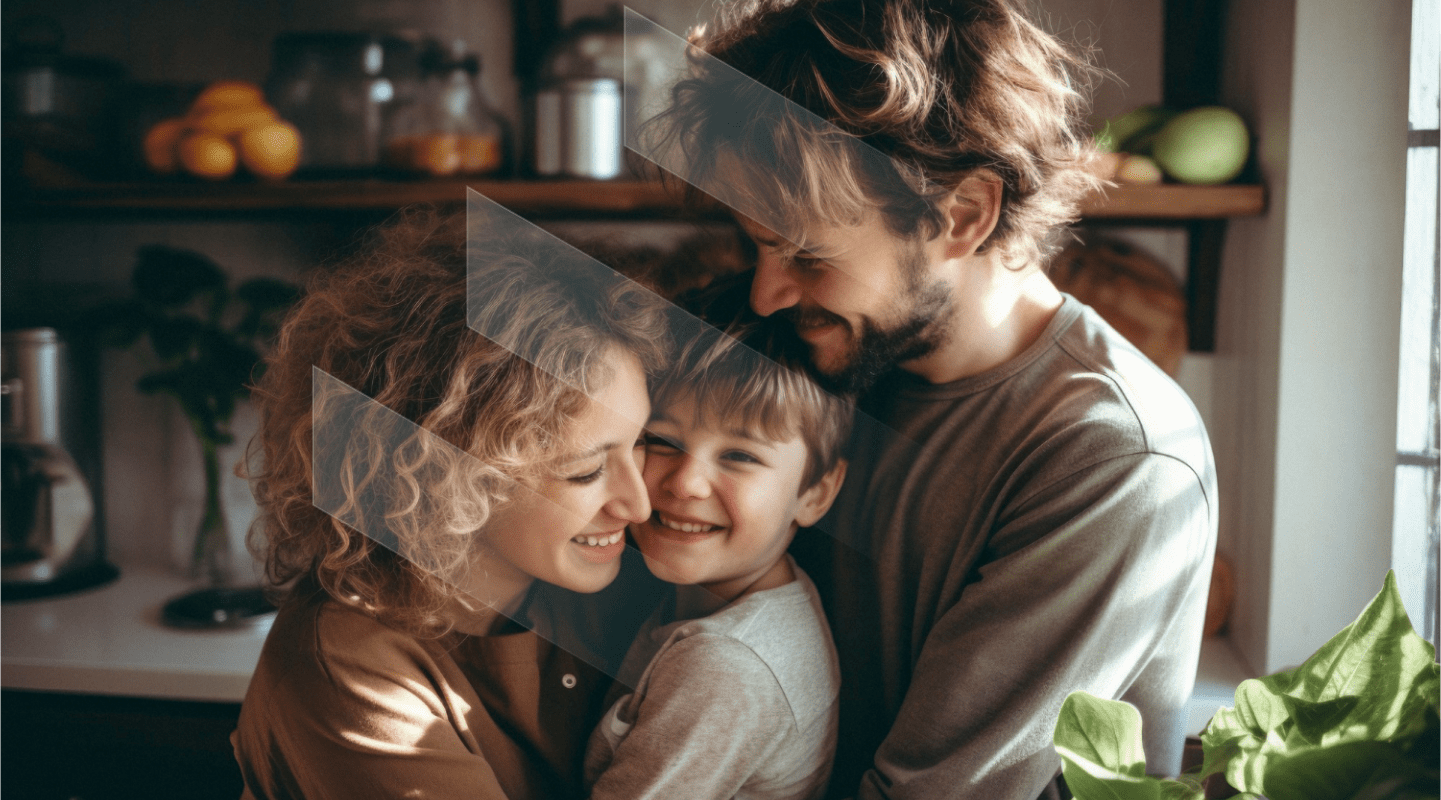 a man and a woman are hugging a little boy