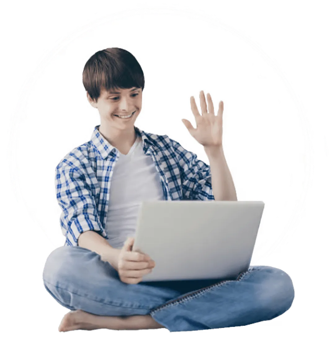 a woman sitting on the floor using a laptop