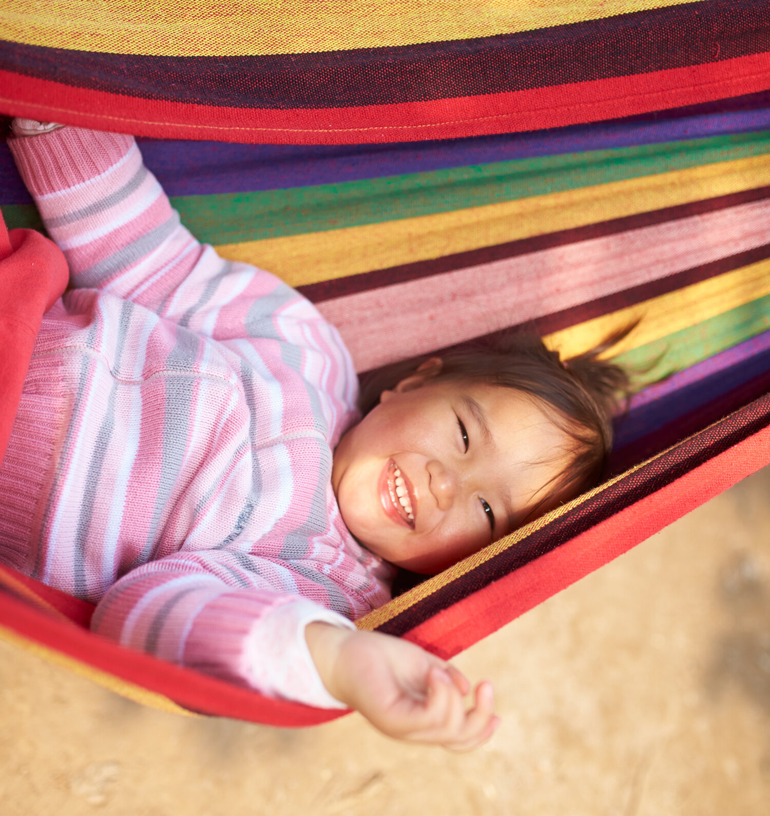 child at hammock at Building Blocks Therapy