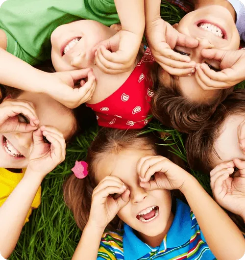 Kids laying on grass