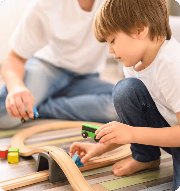 A boy playing with blocks