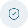 Blue shield icon with a checkmark inside on a light gray circular background.