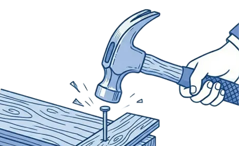 Hand holding a hammer hitting a nail into a wooden plank with wood grain texture.