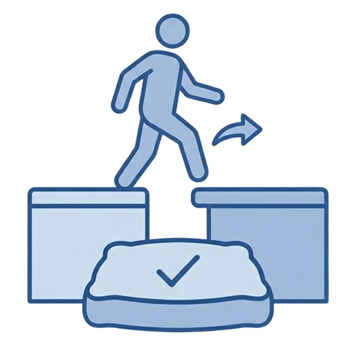 Icon of a person stepping across blocks with a check-marked cushion below, indicating a safe step or support.