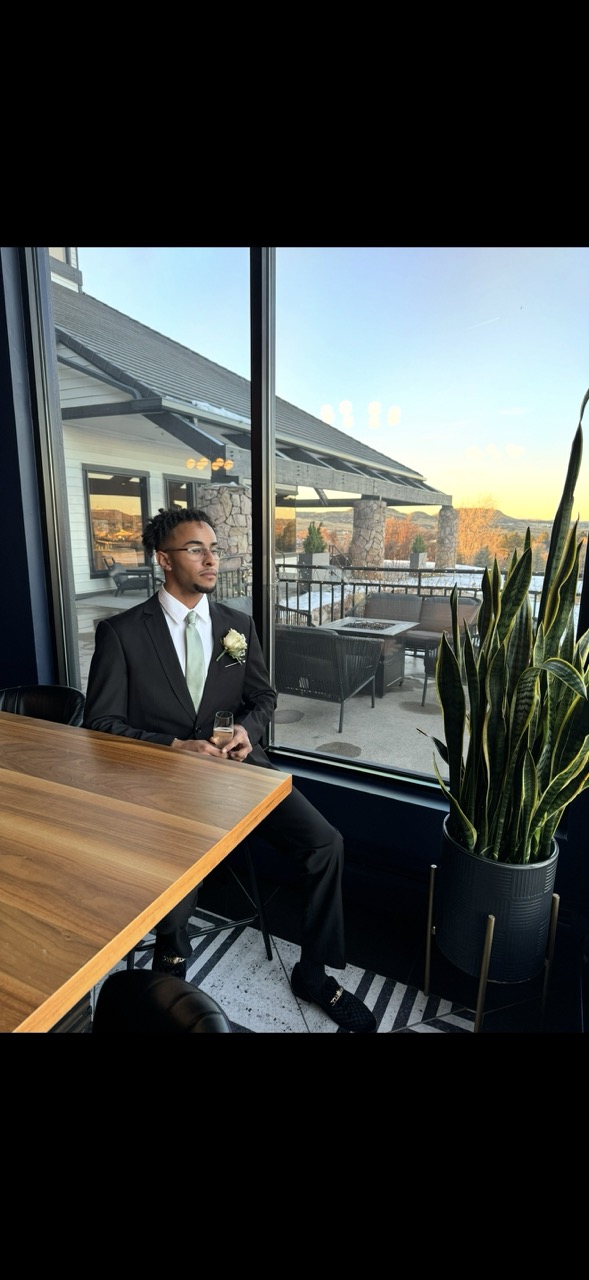 [headshot] image of satisfied student using a laptop