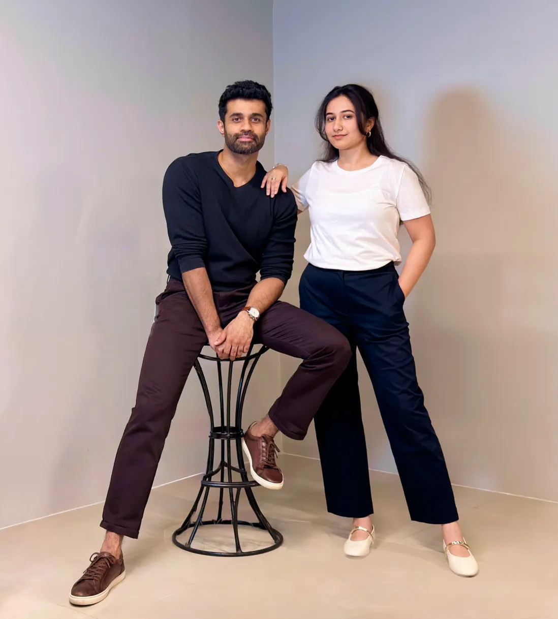 A man and a woman posing for a picture.