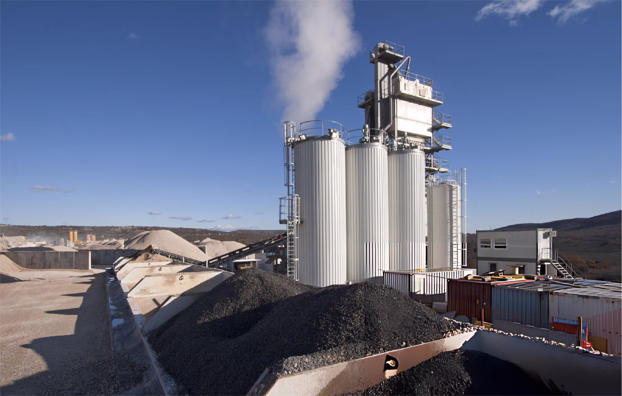 Baldwin Paving asphalt plant with storage silos and aggregate stockpiles in Georgia