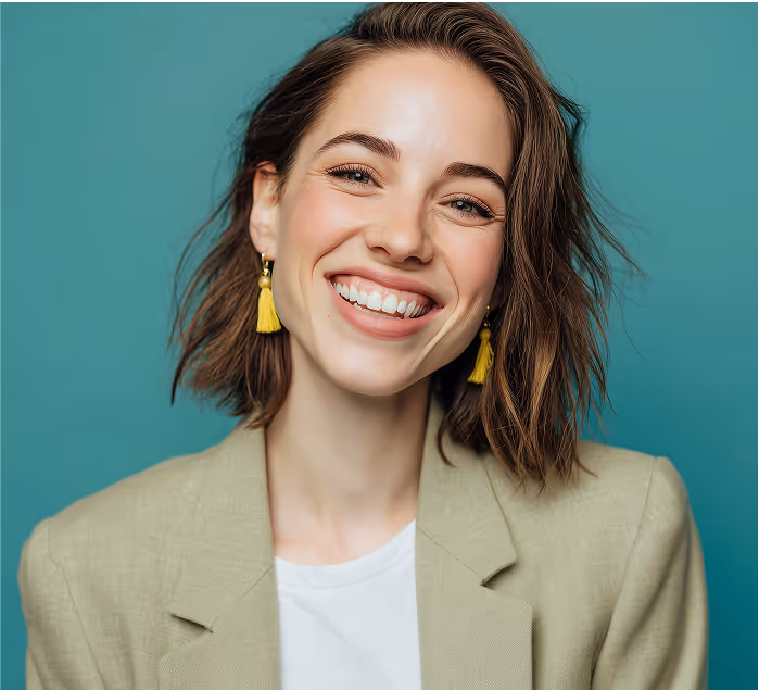 A formally dressed woman smiling confidently, conveying professionalism and trust in recruitment services.