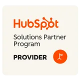 HubSpot Solutions Partner Program Provider Badge with orange flag icon.