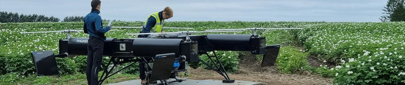 Heavy-lift drone being prepared in the field for the AGAVE project