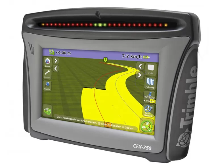 Agricultural GPS device displaying a curved yellow guidance path on a green field map with speed 7.2 km/h.