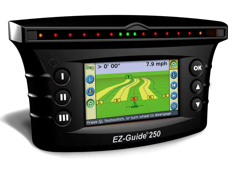 Устройство за навигация EZ-Guide 250 с дисплей, показващ селскостопански полета и управление с бутони.