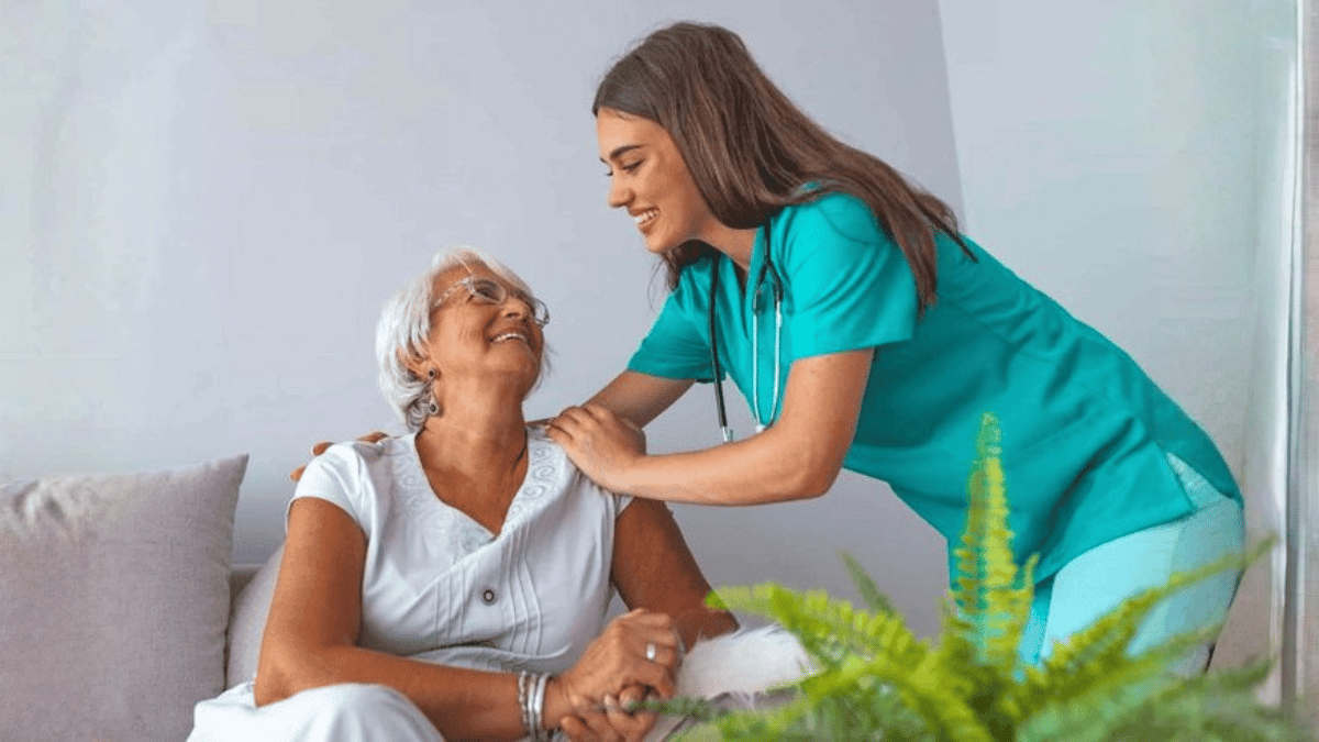 Nurse caring for elderly women.