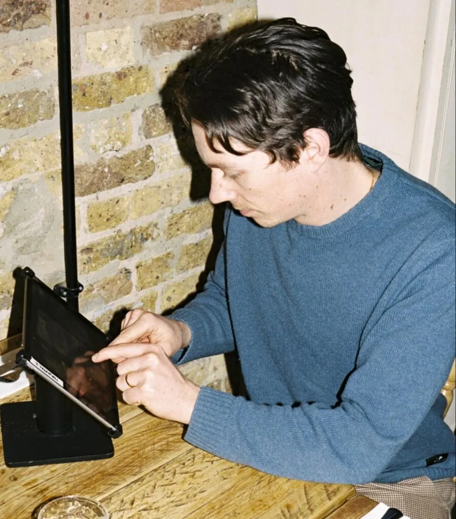 Someone using Nory on an iPad to analyse restaurant costs