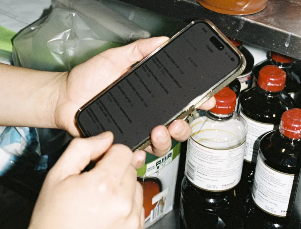 Someone using the Nory app to manage inventory