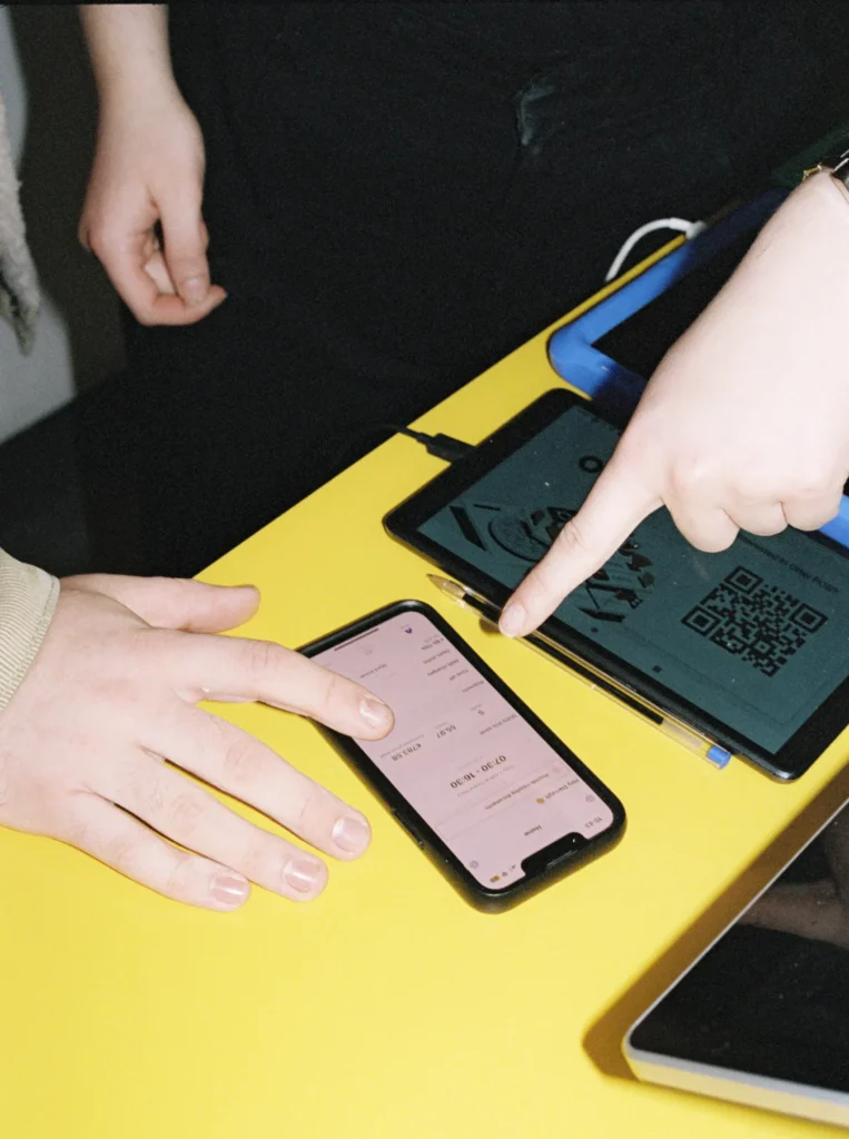 Two people using Nory's mobile app