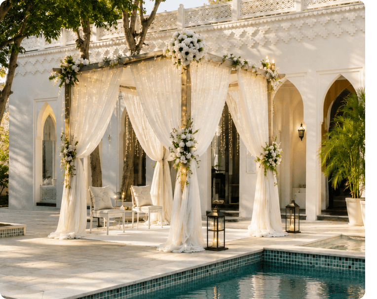 White floral canopy with drapes set up poolside for a wedding