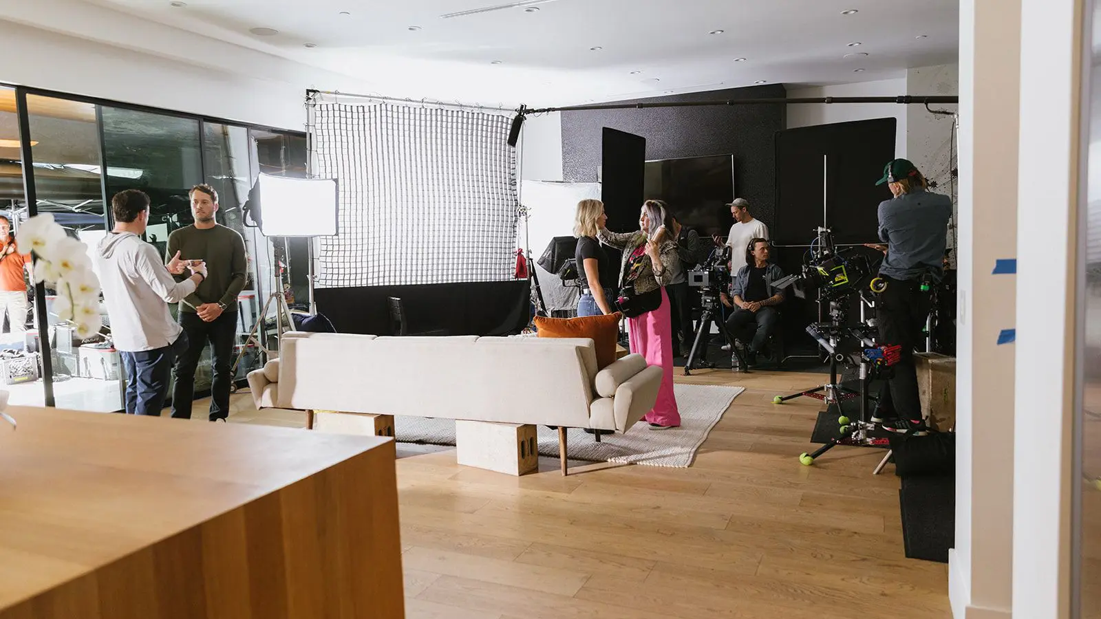 STMNT Studios production crew on set with lighting rigs and cameras during a San Francisco video shoot