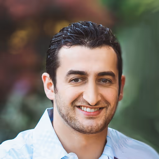 Headshot of Pavel Yusupov, Vice President of Customer Success at Ambient.ai