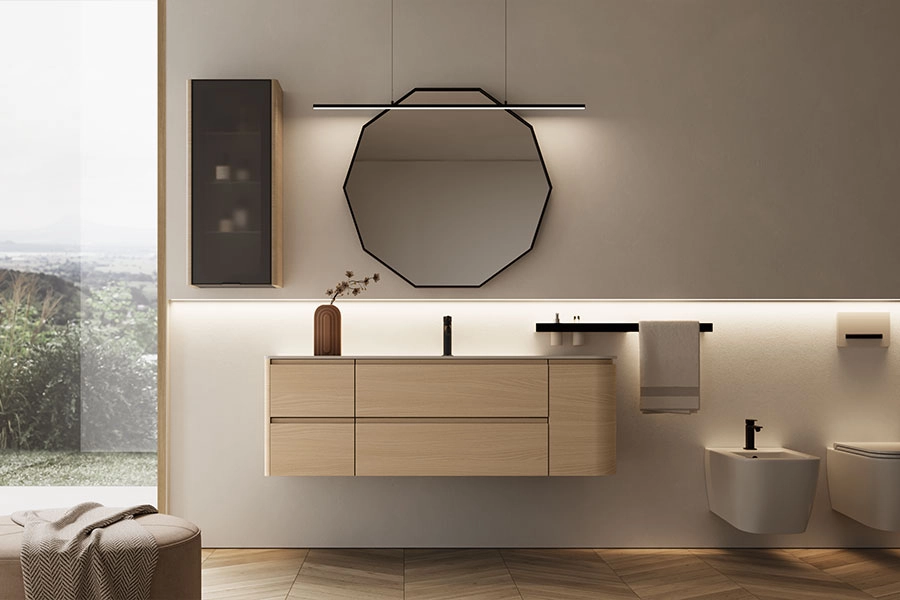 Modern bathroom with floating light wood vanity, black octagonal mirror, wall-mounted bidet and toilet, and large window overlooking greenery.