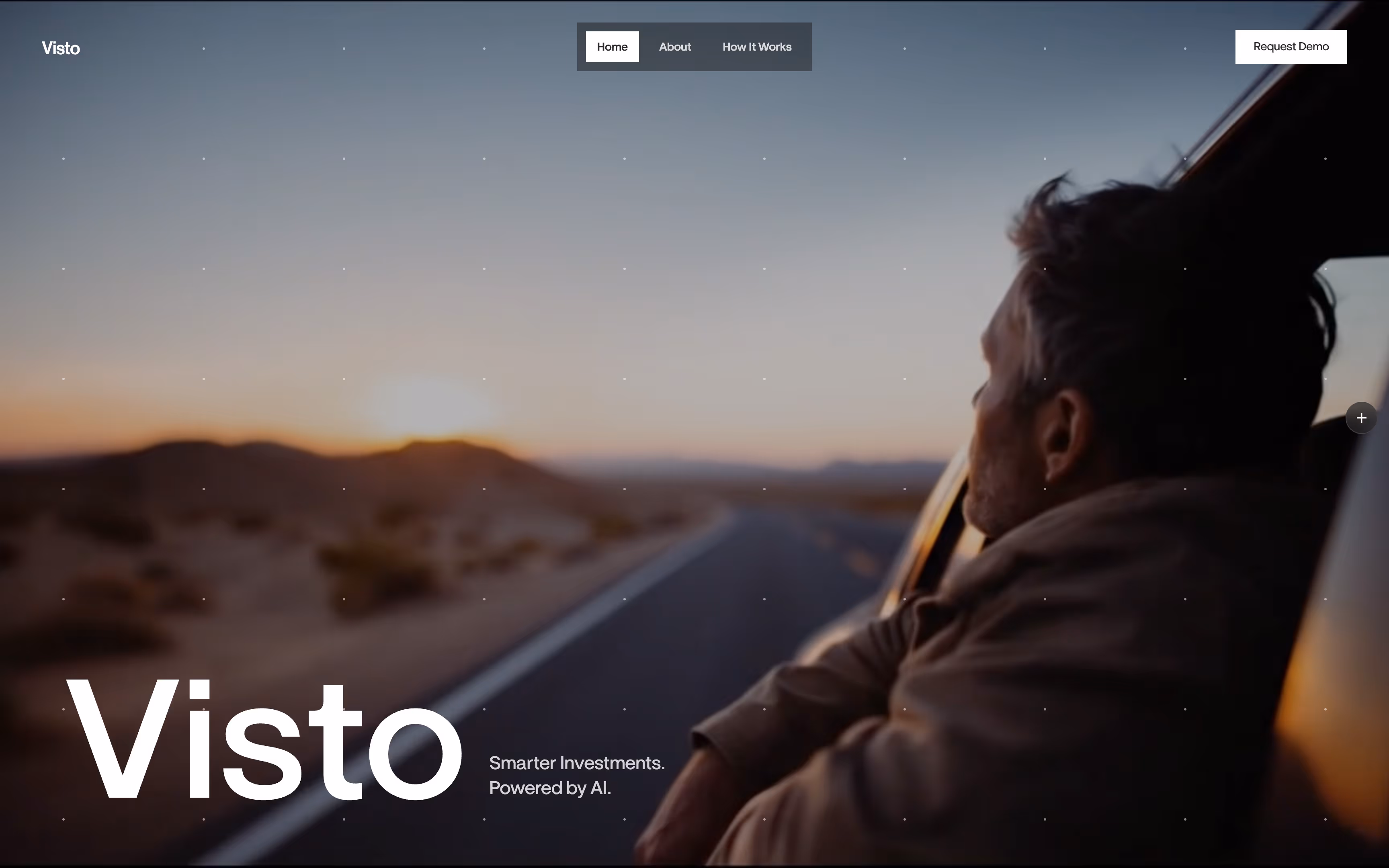 Man leaning out of car window looking at sunset over a desert road with the text 'Visto Smarter Investments. Powered by AI.'
