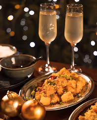 Champagne and a festive dish at Mama Yo
