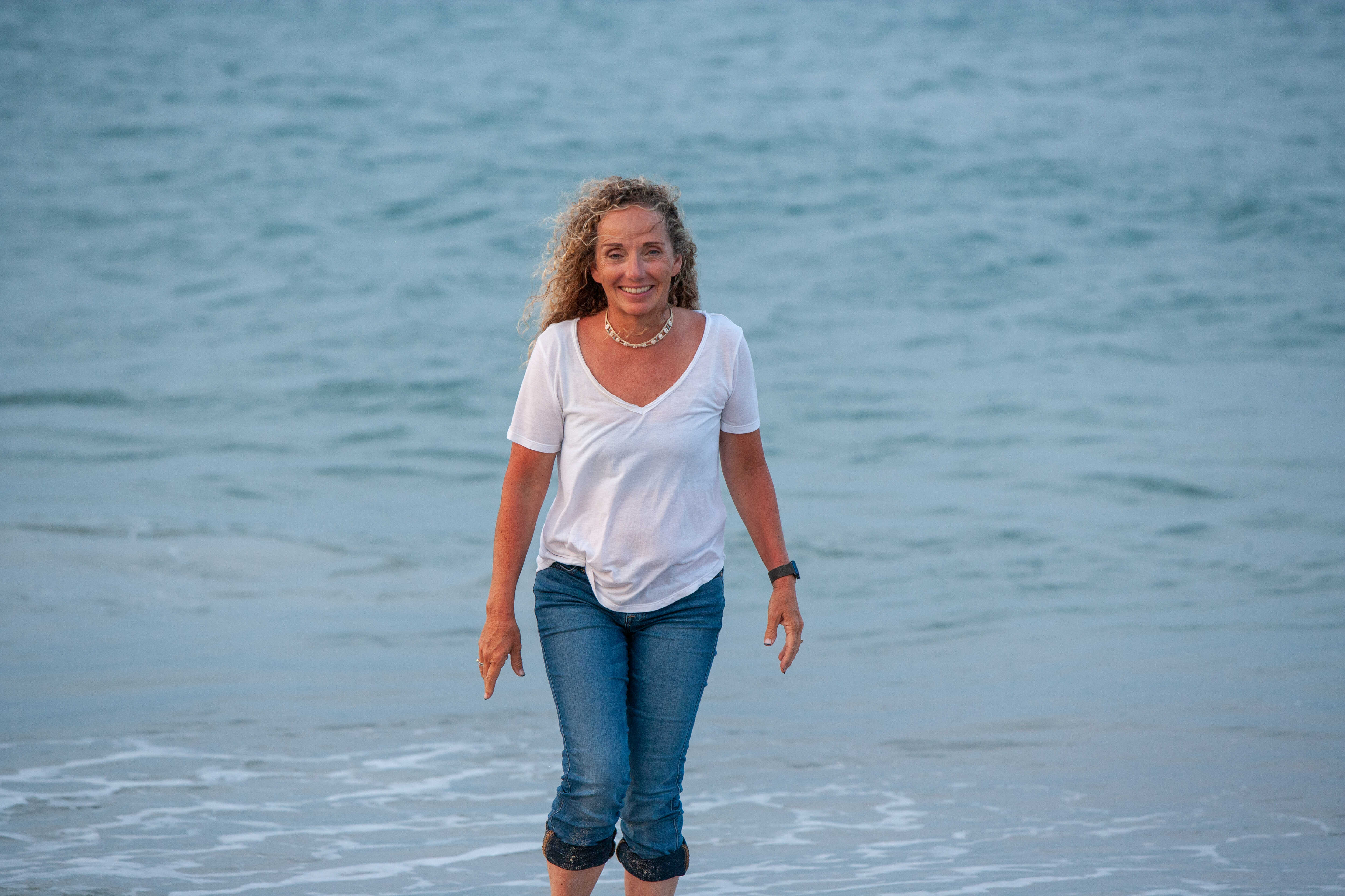 Wendy Cooper walking on the beach