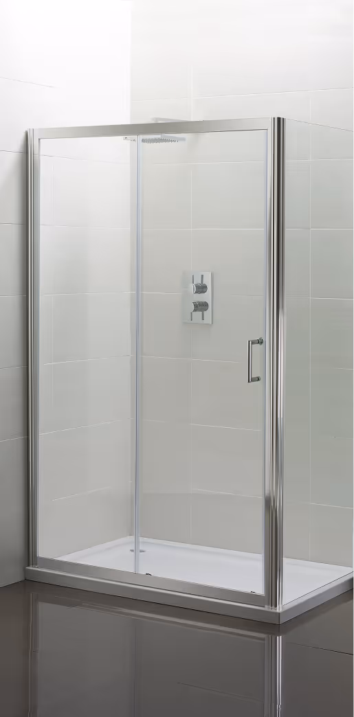 Modern glass corner shower enclosure with silver trim, white tiled walls, and a wall-mounted shower control panel.
