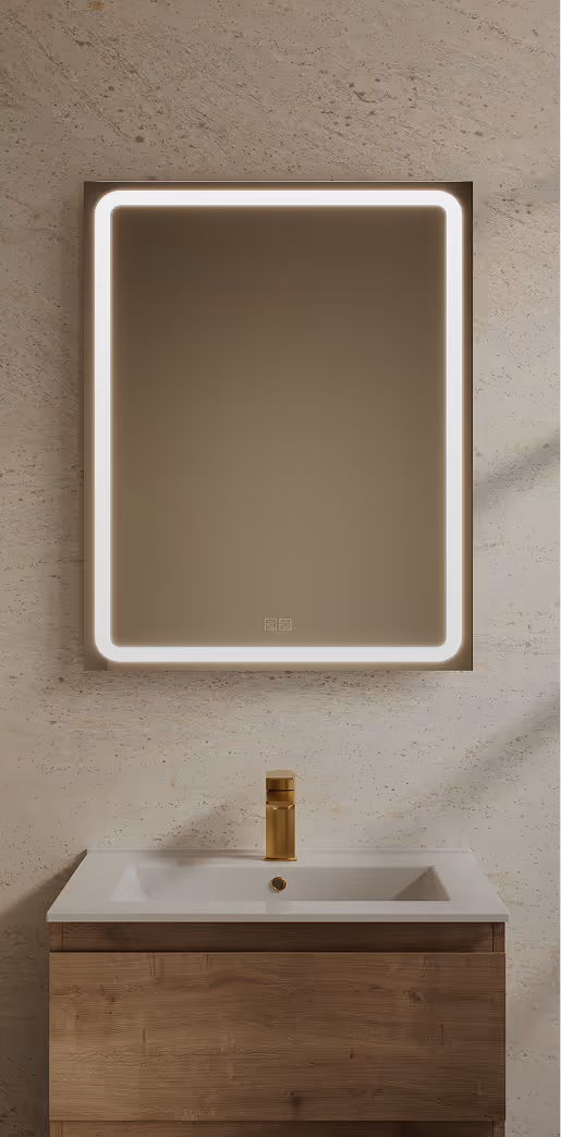 Modern bathroom vanity with wooden cabinet, white sink, gold faucet, and rectangular backlit mirror on a beige textured wall.