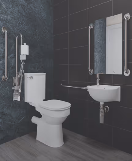 Accessible bathroom with a white toilet, wall-mounted sink, and grab bars for support on dark tiled walls.