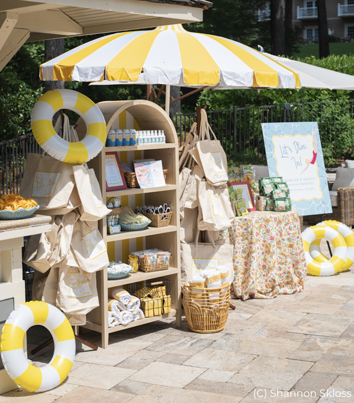 Hands opening premium branded gift box with custom tissue paper