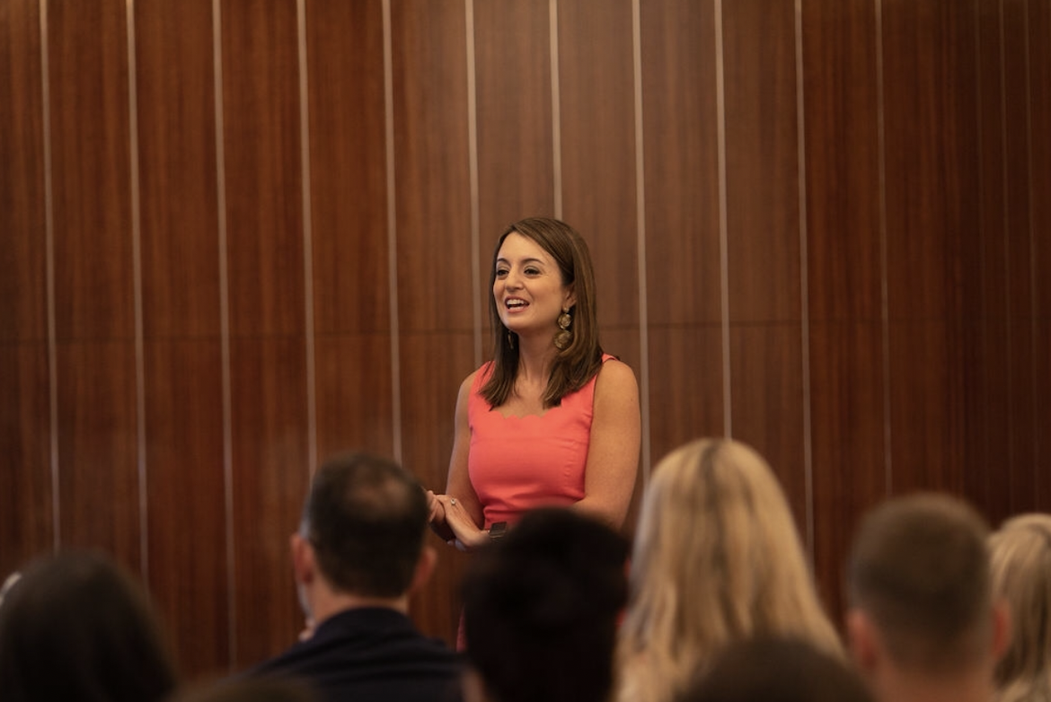 Tracie Domino speaking to an audience