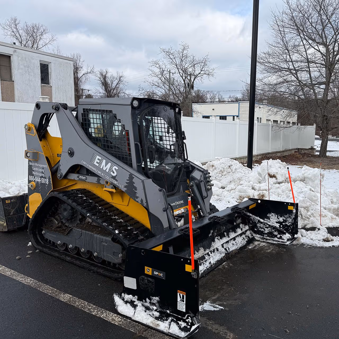 Commercial snow plowing services by Earth Management Solutions LLC