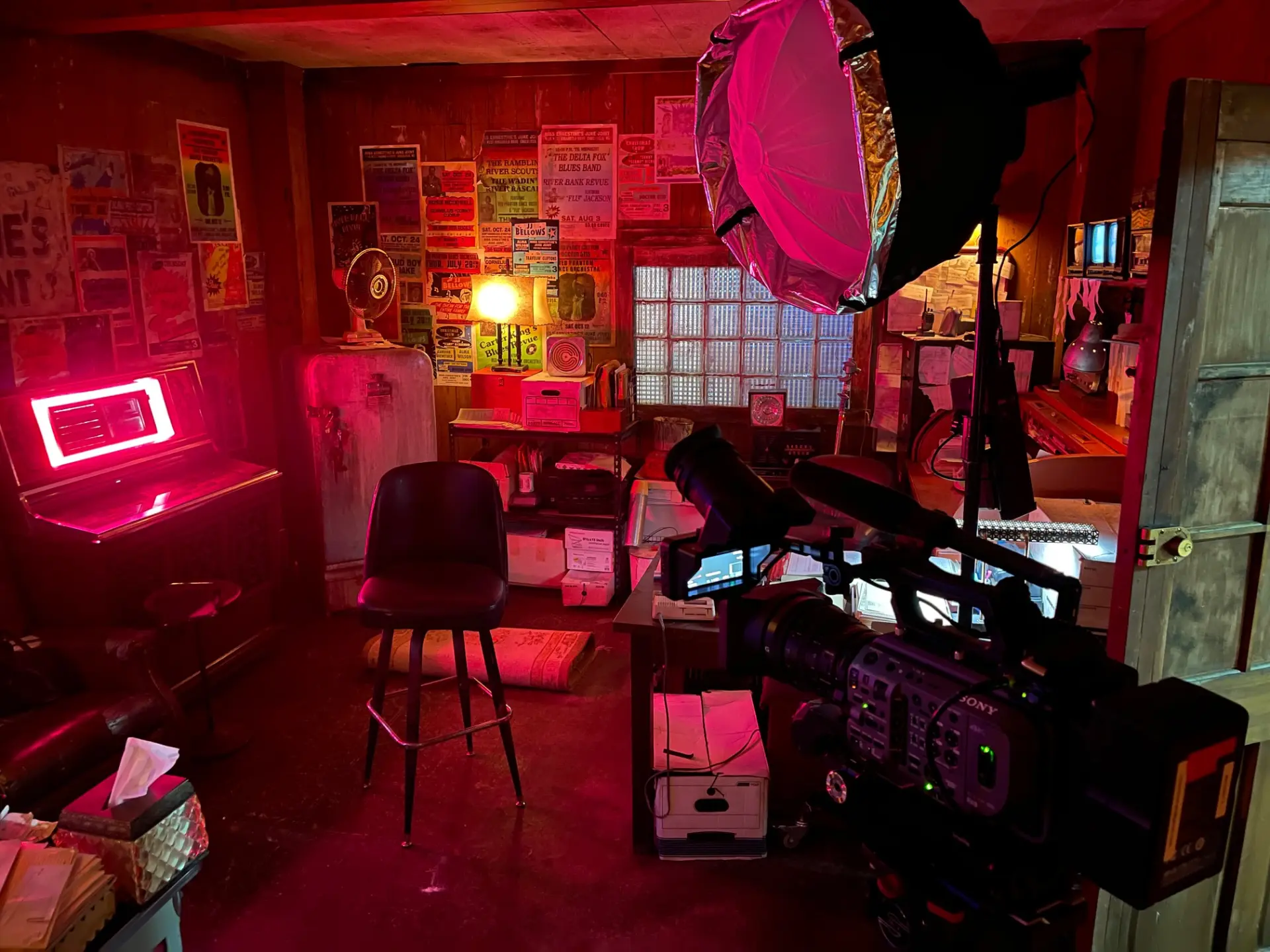 Studio with camera and lighting equipment.