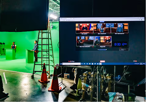 Green screen studio setup used for streaming TV advertising and live broadcast video production
