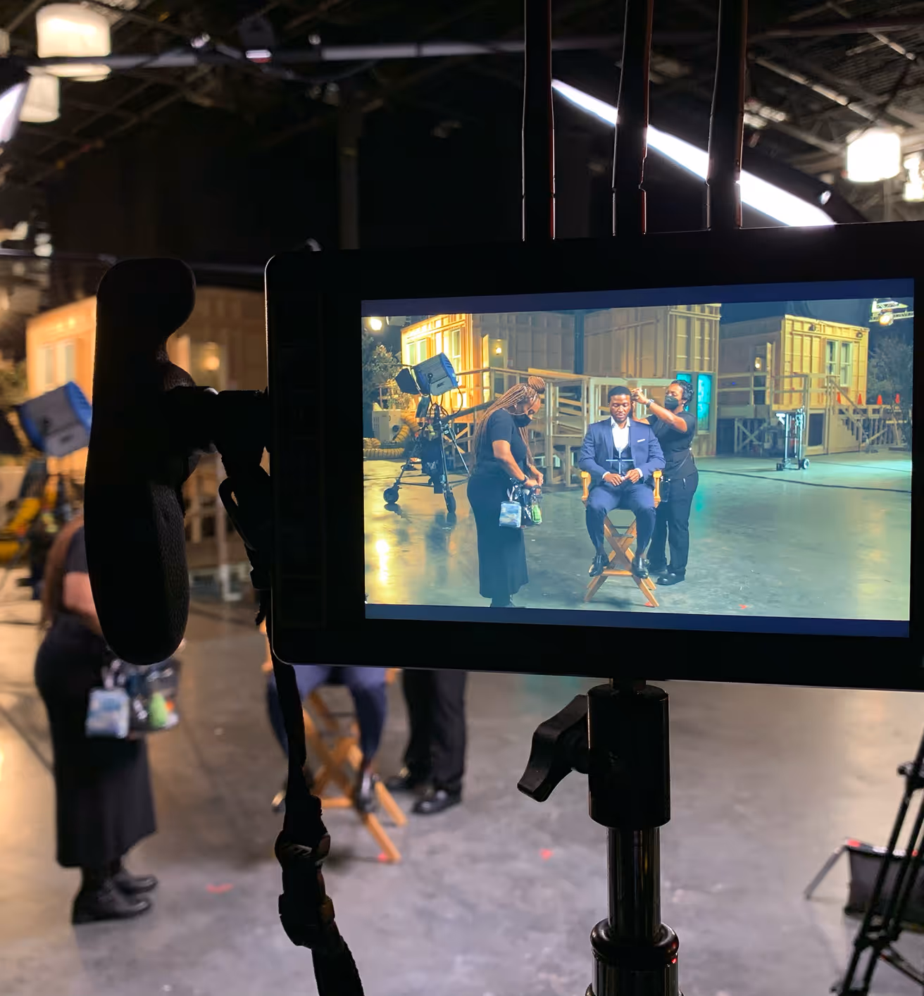 Camera monitor showing talent prep on a mini documentary shoot