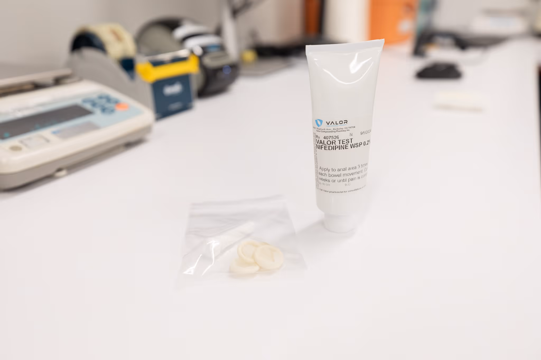 photo of nifedipine with an applicator and finger cot