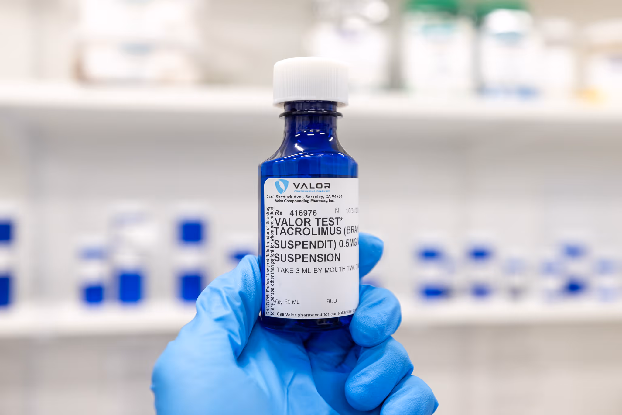 photo of tacrolimus in a blue bottle