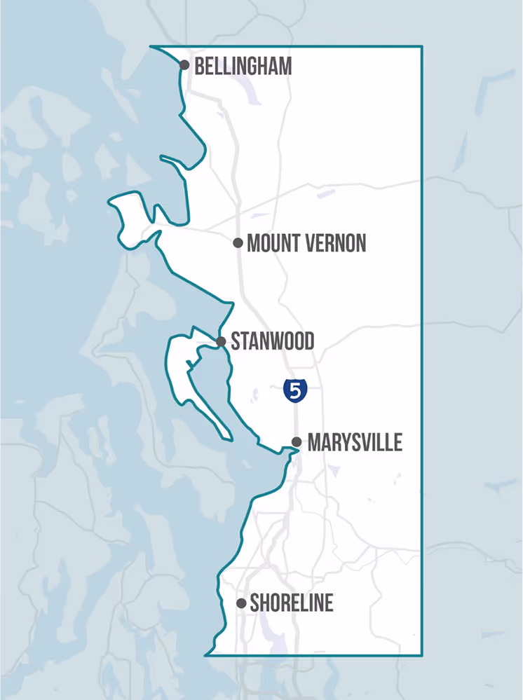 Map outline of Snohomish County, Washington, showing labeled cities Bellingham, Mount Vernon, Stanwood, Marysville, and Shoreline, with Interstate 5 marked.