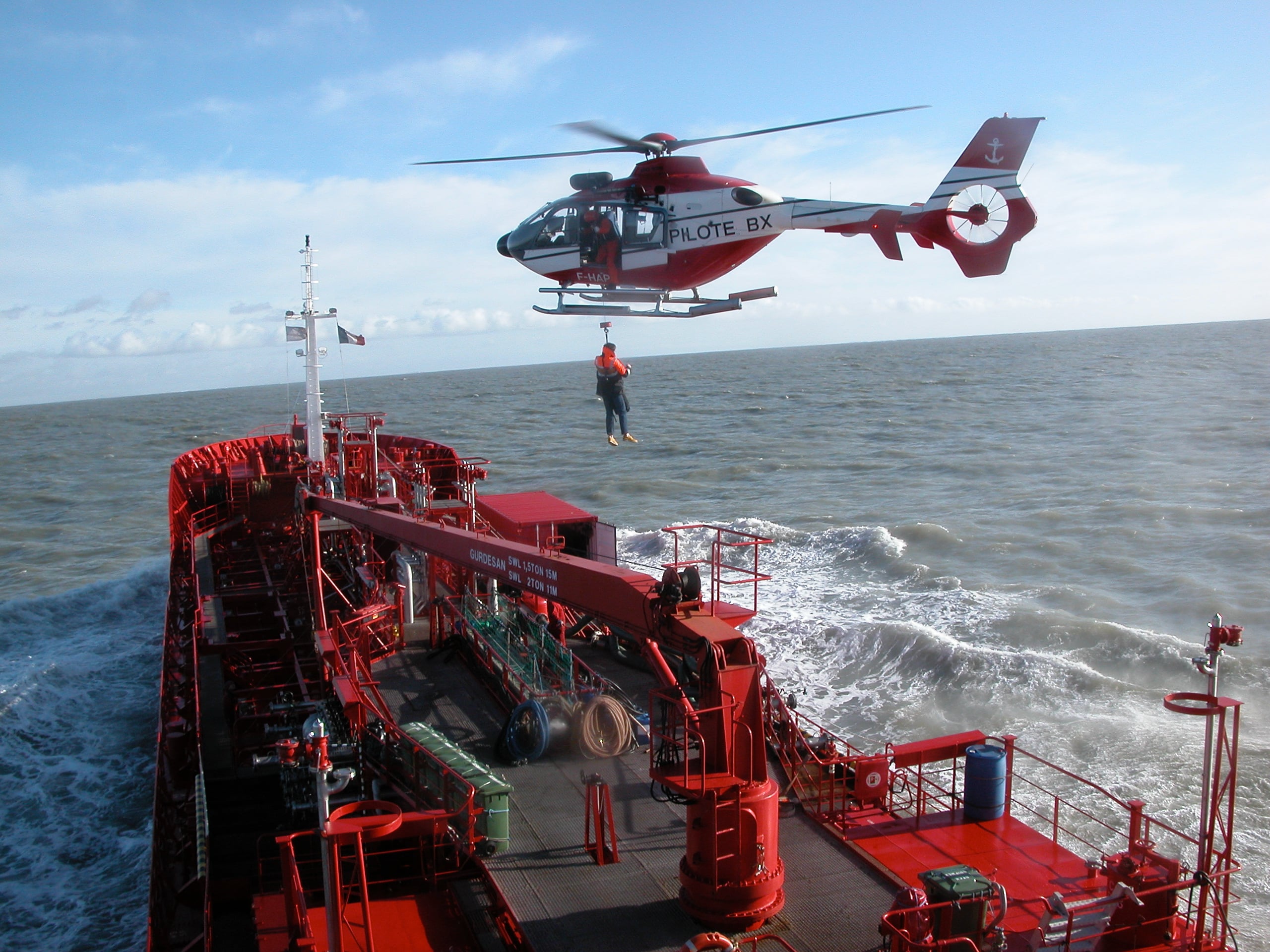 BX Pilot Helicopter: Helicopter winching of a pilot from an oil tanker