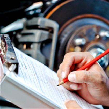 Inspection specialist marking off checklist