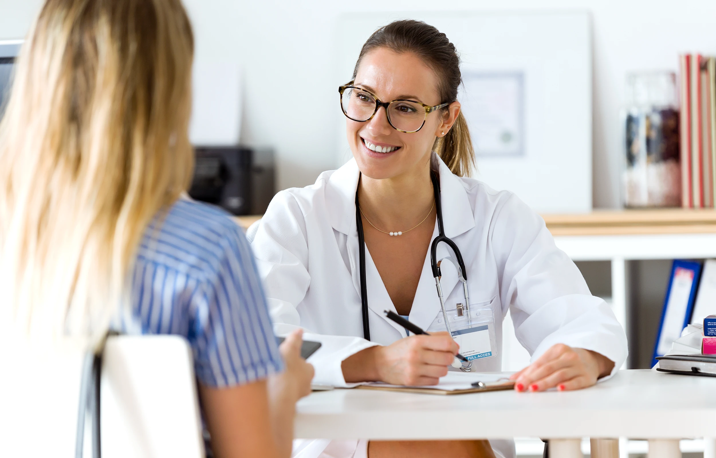 Dr. talking to a client